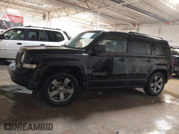 2014 Jeep Patriot High Altitude with VIN 1C4NJPFAXED679271, listed as a IAAI auction lot 41290600 with 157,256 mi miles and . Bid and sale history available at carsss.com. Image 14.