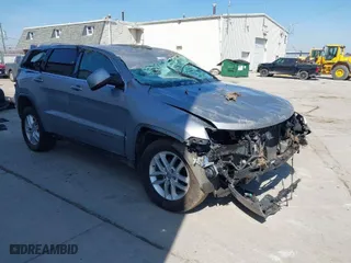 2018 Jeep Grand Cherokee Laredo E with VIN 1C4RJFAG8JC130465, listed as a IAAI auction lot 41789688 with 133,299 mi miles. Bid and sale history available at carsss.com. Image 1.