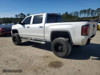 2018 GMC Sierra 1500 Denali with VIN 3GTU2PEC9JG299248, listed as a Copart auction lot 42363545 with 129,029 mi miles and Salvage Title. Bid and sale history available at carsss.com. Image 2.