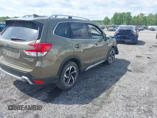 2022 Subaru Forester Touring with VIN JF2SKARC0NH495770, listed as a IAAI auction lot 42214841 with 36,509 mi miles and . Bid and sale history available at DreamBid. Image 4.