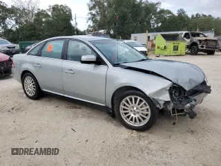 2007 Mercury Montego Premier z VIN 1MEHM42117G604211, wystawiony jako Copart lot #79867734 z przebiegiem 69 585 mil mil oraz Szkoda całkowita • Salvage title. Historia ofert i sprzedaży dostępna na DreamBid. Obrazek 4.