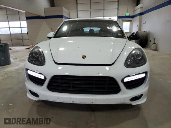 2013 Porsche Cayenne GTS with VIN WP1AD2A24DLA76344, listed as a Copart auction lot 83570884 with 63,704 mi miles and Salvage title. Bid and sale history available at DreamBid. Image 5.