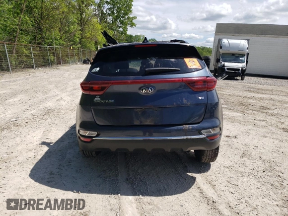 2021 Kia Sportage EX with VIN KNDPNCAC0M7847575, listed as a Copart auction lot 57667035 with Not provided miles and Salvage title. Bid and sale history available at DreamBid. Image 6.