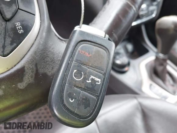 2015 Jeep Cherokee Trailhawk with VIN 1C4PJMBS6FW575517, listed as a IAAI auction lot 42661199 with 299,166 mi miles and . Bid and sale history available at DreamBid. Image 11.