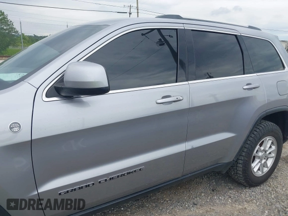 2018 Jeep Grand Cherokee Laredo E with VIN 1C4RJFAG4JC475993, listed as a IAAI auction lot 42295008 with 106,024 mi miles and . Bid and sale history available at DreamBid. Image 15.