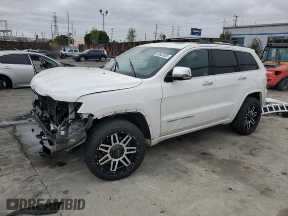2015 Jeep Grand Cherokee Overland with VIN 1C4RJECG7FC872175, listed as a Copart auction lot 50653205 with 117,433 mi miles and Salvage title. Bid and sale history available at DreamBid. Image 1.