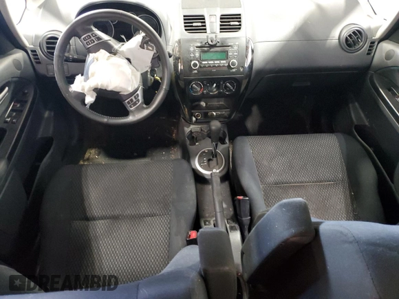 2013 Suzuki SX4 Crossover z VIN JS2YB5A3XD6101784, wystawiony jako Copart lot #45408295 z przebiegiem Nie podano mil oraz Szkoda całkowita • Salvage title. Historia ofert i sprzedaży dostępna na DreamBid. Obrazek 8.