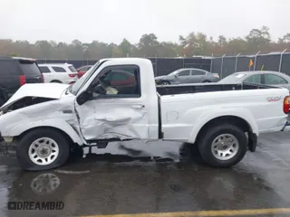 2002 Mazda B-Series 2WD Truck DS with VIN 4F4YR12U82TM11900, listed as a IAAI auction lot 40773356 with 118,353 mi miles. Bid and sale history available at carsss.com. Image 14.