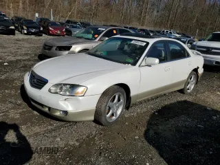 2002 Mazda Millenia S with VIN JM1TA222521733260, listed as a Copart auction lot 49984755 with 140,212 mi miles and Salvage Title. Bid and sale history available at DreamBid. Image 1.