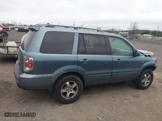 2006 Honda Pilot EX-L with RES with VIN 2HKYF18646H555514, listed as a IAAI auction lot 41703223 with 292,487 mi miles. Bid and sale history available at carsss.com. Image 14.
