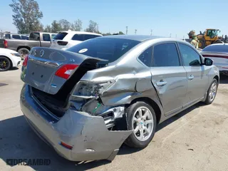 2014 Nissan Sentra SR with VIN 3N1AB7AP6EL698081, listed as a IAAI auction lot 41984797 with 64,384 mi miles. Bid and sale history available at carsss.com. Image 4.
