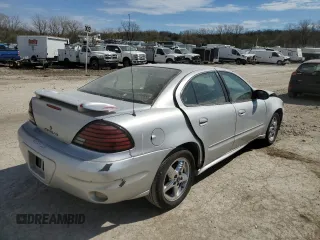 2004 Pontiac Grand Am SE1 z VIN 1G2NF52E24M516423, wystawiony jako Copart lot #50738105 z przebiegiem 196 844 mil mil oraz Szkoda całkowita • Salvage title. Historia ofert i sprzedaży dostępna na DreamBid. Obrazek 3.