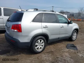 2012 Kia Sorento LX with VIN 5XYKTCA69CG271965, listed as a IAAI auction lot 41707016 with 104,093 mi miles. Bid and sale history available at carsss.com. Image 4.