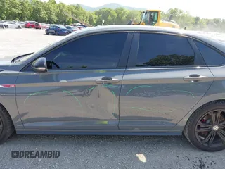 2021 Volkswagen Jetta GLI S z VIN 3VW6T7BU9MM052902, wystawiony jako IAAI lot #42286711 z przebiegiem 91 519 mil mil oraz . Historia ofert i sprzedaży dostępna na DreamBid. Obrazek 19.