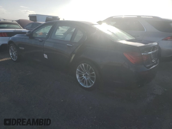2015 BMW 7 Series 750Li xDrive with VIN WBAYF8C58FD654184, listed as a Copart auction lot 77203184 with 122,955 mi miles and Non Repairable. Bid and sale history available at DreamBid. Image 2.
