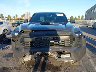 2024 Toyota Tacoma 4WD SR5 with VIN 3TMLB5JN3RM046513, listed as a IAAI auction lot 41231528 with 7,091 mi miles. Bid and sale history available at carsss.com. Image 12.