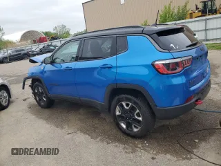 2018 Jeep Compass Trailhawk with VIN 3C4NJDDBXJT139496, listed as a Copart auction lot 57068265 with 105,809 mi miles and Salvage title. Bid and sale history available at DreamBid. Image 2.