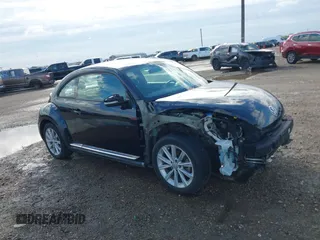 2018 Volkswagen Beetle S with VIN 3VWFD7ATXJM706338, listed as a IAAI auction lot 41293181 with 71,945 mi miles. Bid and sale history available at carsss.com. Image 14.