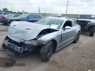 2020 Ford Mustang EcoBoost z VIN 1FA6P8TH2L5186210, wystawiony jako IAAI lot #42103657 z przebiegiem 68 790 mil mil oraz . Historia ofert i sprzedaży dostępna na DreamBid. Obrazek 2.