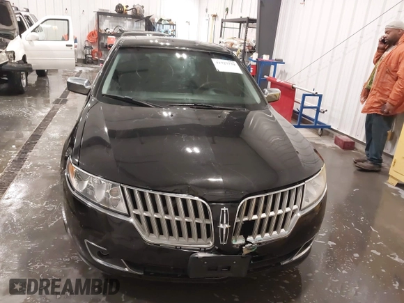 2012 Lincoln MKZ with VIN 3LNHL2GC1CR826247, listed as a IAAI auction lot 41727774 with 136,588 mi miles. Bid and sale history available at carsss.com. Image 12.