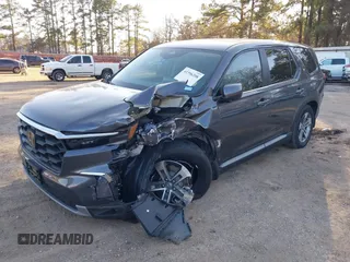2023 Honda Pilot EX-L with VIN 5FNYG1H5XPB044829, listed as a IAAI auction lot 41396208 with 15,277 mi miles and . Bid and sale history available at DreamBid. Image 2.