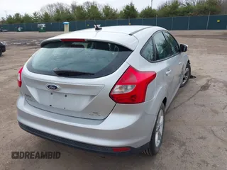 2014 Ford Focus SE with VIN 1FADP3K2XEL449744, listed as a IAAI auction lot 41829228 with 103,032 mi miles. Bid and sale history available at carsss.com. Image 4.