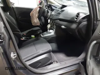 2015 Ford Fiesta SE with VIN 3FADP4BJ9FM164093, listed as a IAAI auction lot 41308905 with 75,839 mi miles. Bid and sale history available at carsss.com. Image 5.