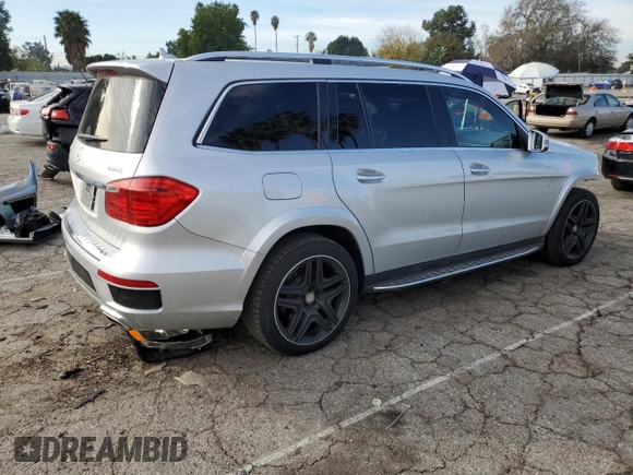 2015 Mercedes-Benz GL-Class GL 550 with VIN 4JGDF7DE7FA455957, listed as a Copart auction lot 39546504 with 132,568 mi miles. Bid and sale history available at carsss.com. Image 3.