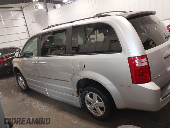 2010 Dodge Grand Caravan SXT with VIN 2D4RN5D15AR261319, listed as a IAAI auction lot 41877022 with 142,292 mi miles and . Bid and sale history available at DreamBid. Image 14.