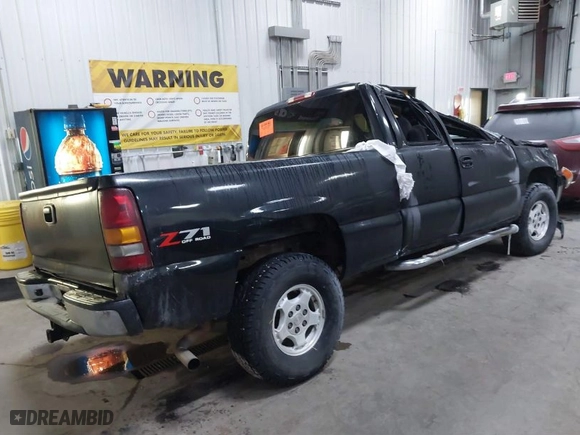2002 Chevrolet Silverado 1500 LS with VIN 2GCEK19T321291409, listed as a IAAI auction lot 41391207 with 234,690 mi miles. Bid and sale history available at carsss.com. Image 4.