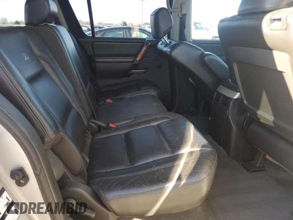 2006 Infiniti QX56 z VIN 5N3AA08A16N804708, wystawiony jako Copart lot #86788354 z przebiegiem 205 417 mil mil oraz Czysty tytuł • Clean title. Historia ofert i sprzedaży dostępna na DreamBid. Obrazek 10.