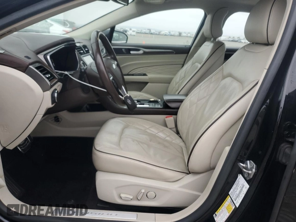 2017 Ford Fusion Titanium z VIN 3FA6P0SU5HR105415, wystawiony jako Copart lot #59779715 z przebiegiem 88 988 mil mil oraz Szkoda całkowita • Salvage title. Historia ofert i sprzedaży dostępna na DreamBid. Obrazek 7.