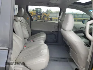 2012 Toyota Sienna XLE AAS z VIN 5TDYK3DC9CS271157, wystawiony jako Copart lot #55418065 z przebiegiem 172 988 mil mil oraz Nie do naprawy • Non repairable. Historia ofert i sprzedaży dostępna na DreamBid. Obrazek 11.