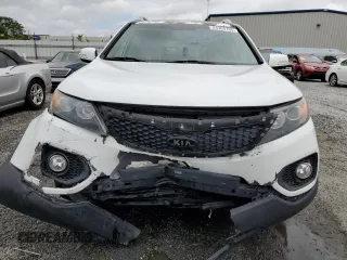 2012 Kia Sorento EX z VIN 5XYKU4A20CG301970, wystawiony jako Copart lot #54360795 z przebiegiem 208 616 mil mil oraz Szkoda całkowita • Salvage title. Historia ofert i sprzedaży dostępna na DreamBid. Obrazek 5.