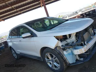 2015 Ford Edge Titanium z VIN 2FMTK4K8XFBB25706, wystawiony jako IAAI lot #42263349 z przebiegiem 160 193 mil mil oraz . Historia ofert i sprzedaży dostępna na DreamBid. Obrazek 19.