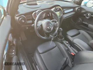 2018 MINI Convertible Cooper S с VIN WMWWG9C58J3E39013, выставлен на аукционе Copart как лот 58946435 с пробегом 66 992 миль миль и На запчасти • Non repairable. История ставок и продаж доступна на DreamBid. Изображение 8.