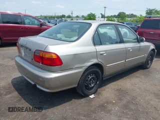 2000 Honda Civic EX z VIN 1HGEJ8647YL033973, wystawiony jako IAAI lot #42465298 z przebiegiem 116 154 mil mil oraz . Historia ofert i sprzedaży dostępna na DreamBid. Obrazek 4.