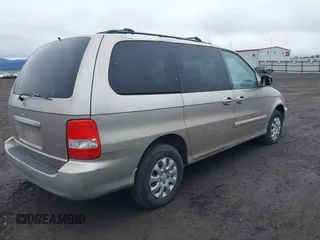 2004 Kia Sedona LX with VIN KNDUP131746563430, listed as a IAAI auction lot 41896386 with 141,526 mi miles. Bid and sale history available at carsss.com. Image 4.