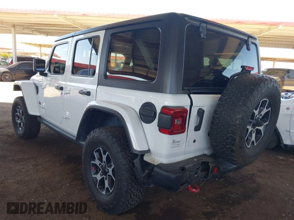 2020 Jeep Wrangler Unlimited Rubicon with VIN 1C4HJXFGXLW107958, listed as a IAAI auction lot 42058477 with 69,951 mi miles and . Bid and sale history available at DreamBid. Image 3.