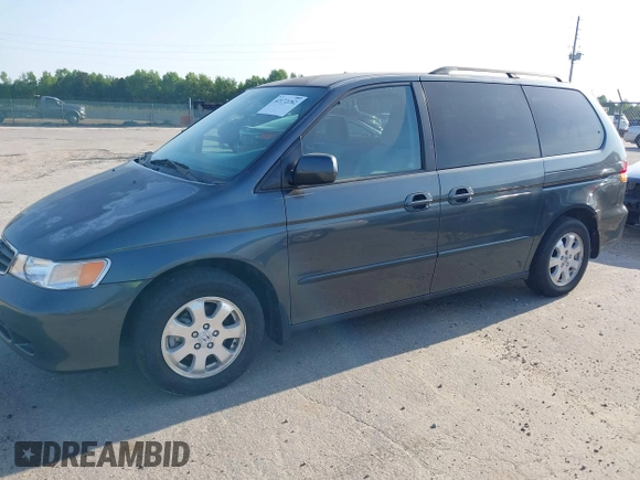 2003 Honda Odyssey EX with VIN 5FNRL18673B112958, listed as a IAAI auction lot 42172282 with 189,521 mi miles and . Bid and sale history available at DreamBid. Image 14.