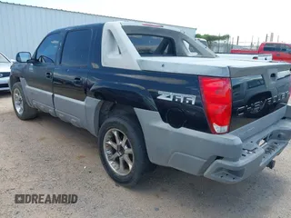 2002 Chevrolet Avalanche z VIN 3GNEC13T22G300623, wystawiony jako IAAI lot #42394549 z przebiegiem 272 961 mil mil oraz . Historia ofert i sprzedaży dostępna na DreamBid. Obrazek 3.