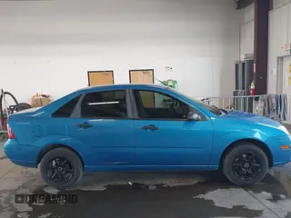 2007 Ford Focus S with VIN 1FAFP34N27W262385, listed as a IAAI auction lot 42526524 with 183,733 mi miles and . Bid and sale history available at DreamBid. Image 13.
