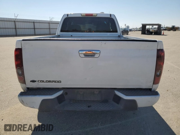 2009 Chevrolet Colorado Work Truck z VIN 1GCCS19E198156770, wystawiony jako Copart lot #50813945 z przebiegiem 186 161 mil mil oraz Szkoda całkowita • Salvage title. Historia ofert i sprzedaży dostępna na DreamBid. Obrazek 6.