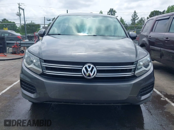 2012 Volkswagen Tiguan SEL with VIN WVGAV7AX8CW005146, listed as a IAAI auction lot 42126959 with 134,005 mi miles and . Bid and sale history available at DreamBid. Image 12.