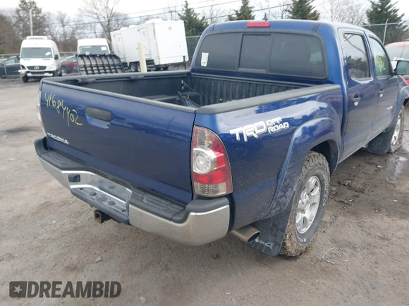 2014 Toyota Tacoma with VIN 3TMLU4EN0EM147243, listed as a IAAI auction lot 41684902 with 308,167 mi miles. Bid and sale history available at carsss.com. Image 4.