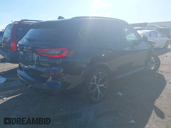 2021 BMW X5 M50i with VIN 5UXJU4C08M9G07925, listed as a IAAI auction lot 40439065 with 20,972 mi miles. Bid and sale history available at carsss.com. Image 4.
