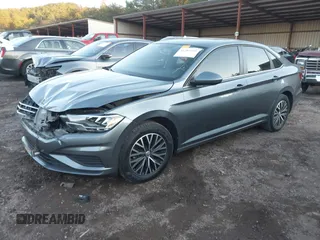 2021 Volkswagen Jetta S z VIN 3VWC57BU2MM023545, wystawiony jako IAAI lot #41285910 z przebiegiem 79 753 mil mil oraz . Historia ofert i sprzedaży dostępna na DreamBid. Obrazek 2.