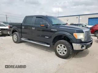 2012 Ford F-150 XL with VIN 1FTFW1ETXCFB32623, listed as a Copart auction lot 54597435 with 210,722 mi miles and Salvage Title. Bid and sale history available at DreamBid. Image 4.