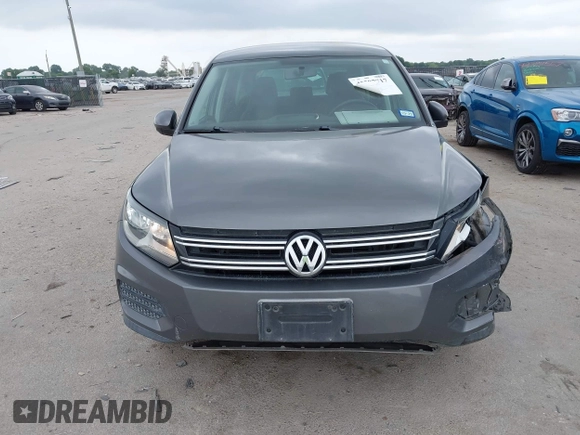 2012 Volkswagen Tiguan SE with VIN WVGAV7AX8CW004451, listed as a IAAI auction lot 42287717 with 110,167 mi miles and . Bid and sale history available at DreamBid. Image 12.
