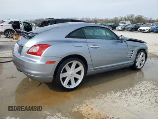 2004 Chrysler Crossfire with VIN 1C3AN69L14X024234, listed as a Copart auction lot 51322415 with 70,243 mi miles and Salvage Title. Bid and sale history available at DreamBid. Image 3.